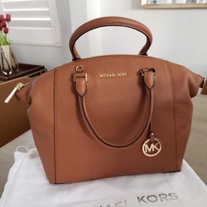 Authentic Michael Kors handbag.